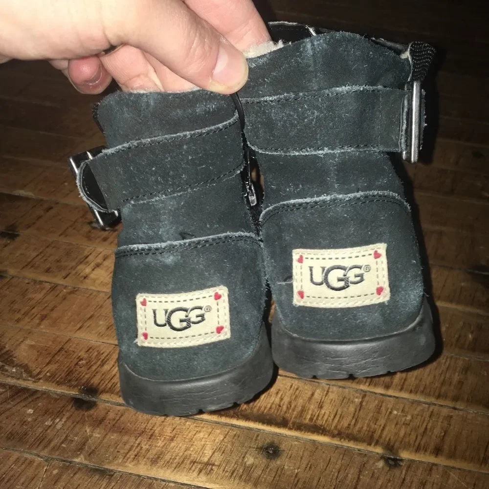 Uggs size 4 shimmery black and silver shearling lined booties